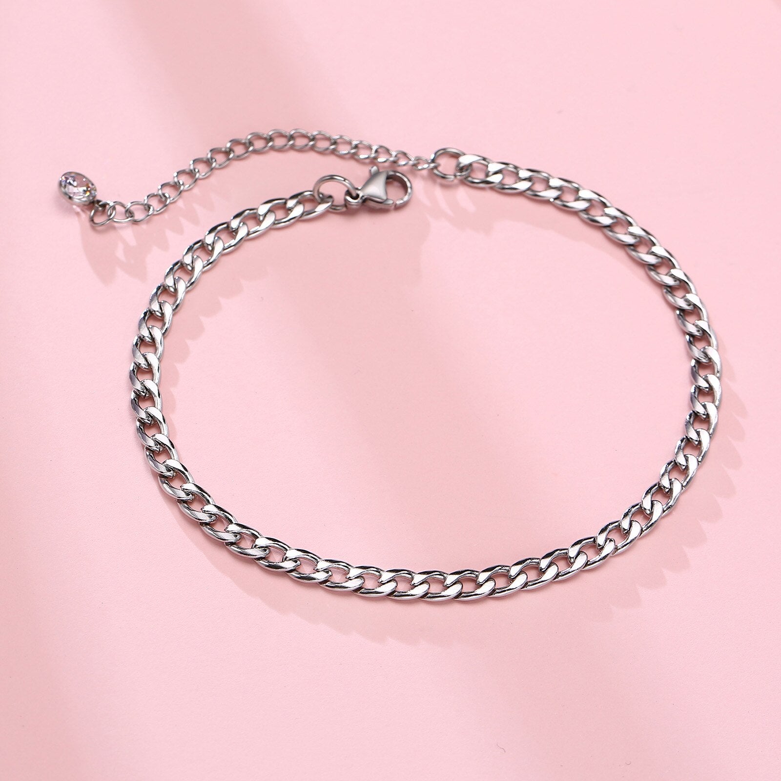 This 2023 stainless steel men's anklet features a double chain with a Cross Charm, perfect for gifting to the special man in your life. - Miscellaneous Accessories