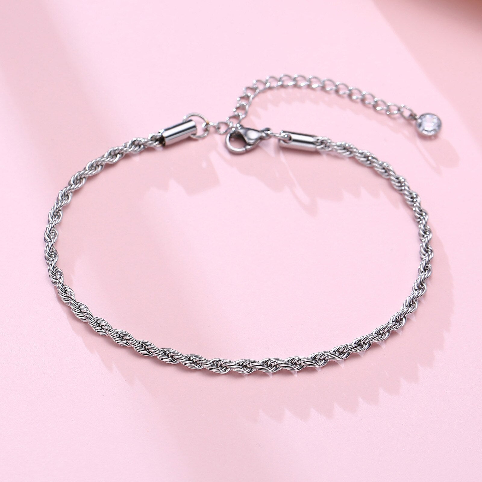 This 2023 stainless steel men's anklet features a double chain with a Cross Charm, perfect for gifting to the special man in your life. - Miscellaneous Accessories