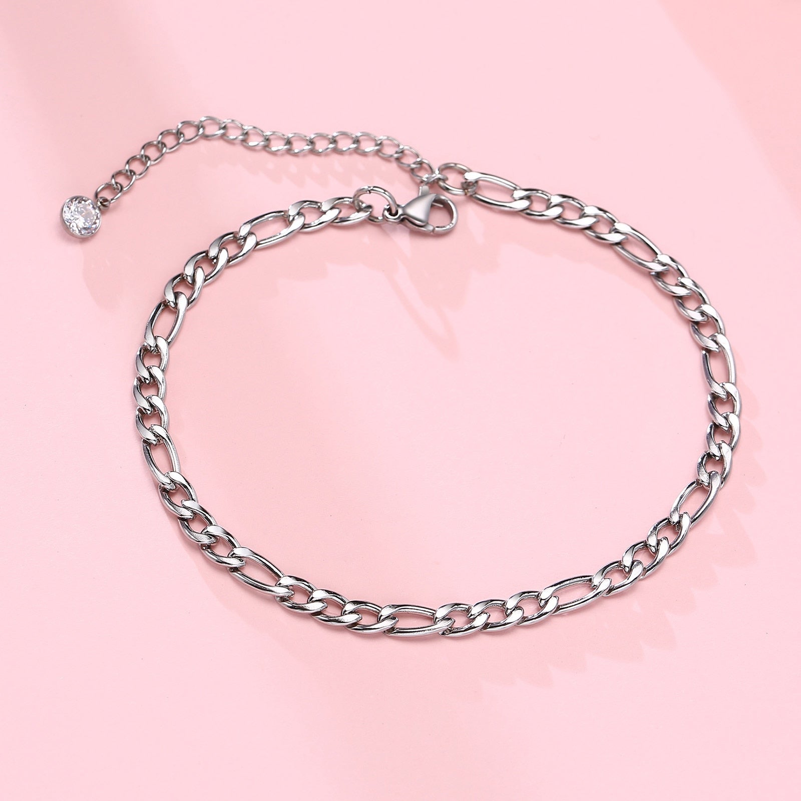 This 2023 stainless steel men's anklet features a double chain with a Cross Charm, perfect for gifting to the special man in your life. - Miscellaneous Accessories